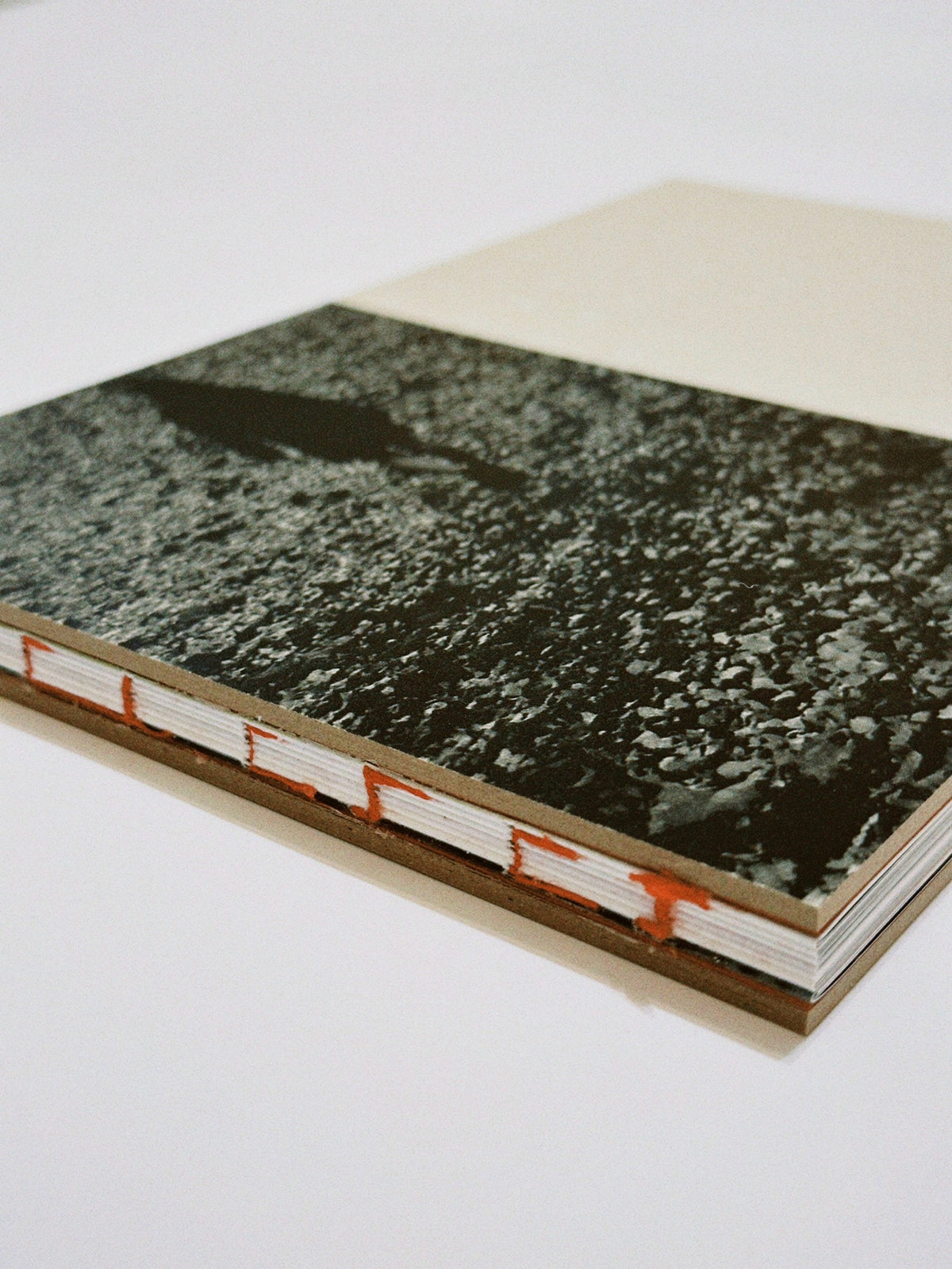 I·N·T·J Zine No. 1 — exposed-spine binding detail